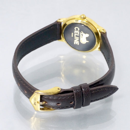 OLD CELINE ラウンド馬車ロゴフェイス腕時計(濃茶)