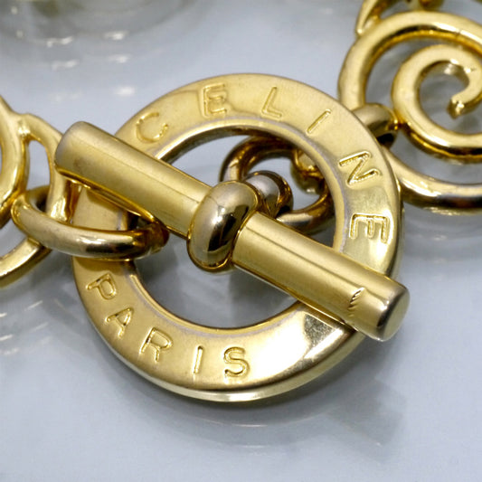 CELINE マンテル留め具大ぶり渦巻きブレスレット(ゴールド)