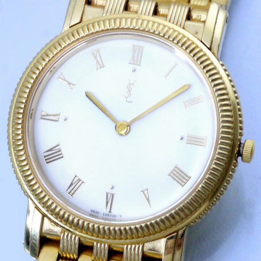 YVES SAINT LAURENT ローマンインデックス蛇腹腕時計(ゴールド)