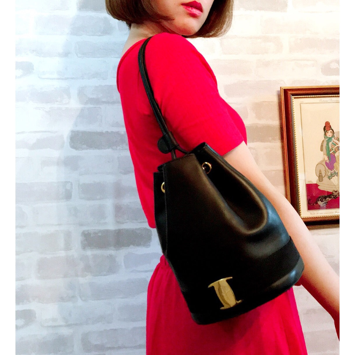 Salvatore Ferragamo　Varaリボン巾着ミニリュック（黒）