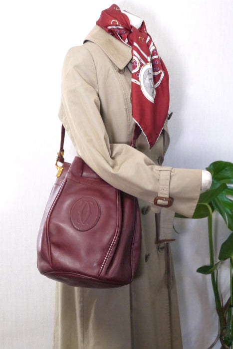 Cartierラグビーボール型巾着ショルダー（ボルドー）