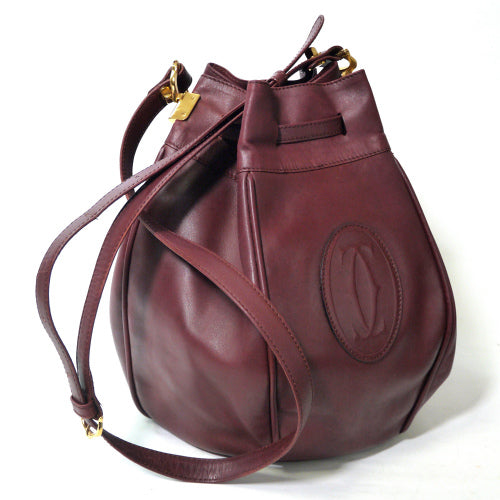 Cartierラグビーボール型巾着ショルダー（ボルドー）