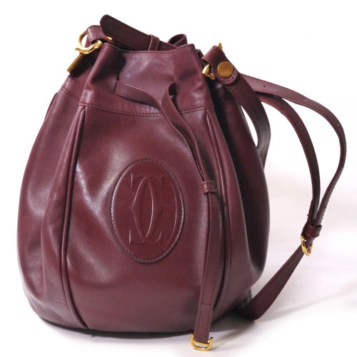 Cartierラグビーボール型巾着ショルダー（ボルドー）