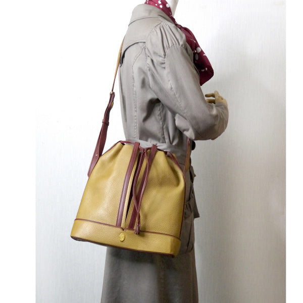 Cartier　マストライン巾着ショルダー（マスタードイエロー）