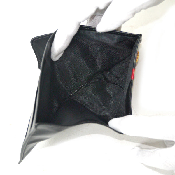 Christian Lacroix　総革製ウェーブライン折り財布（黒）