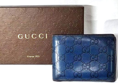 Gucci　二つ折れ型押し財布　（青）