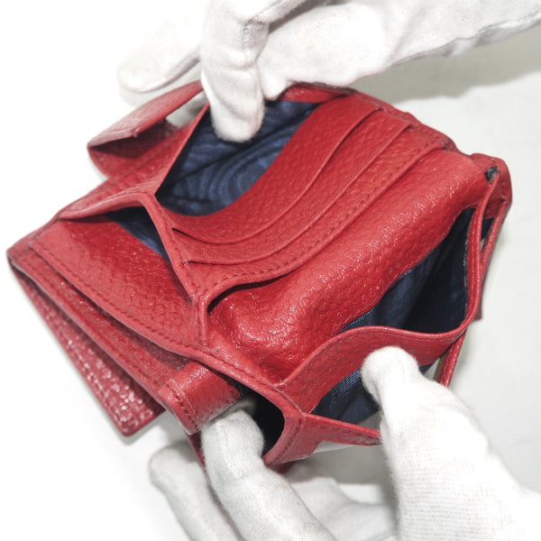 Gucci  型押しレザーWホックシェリー財布（赤）