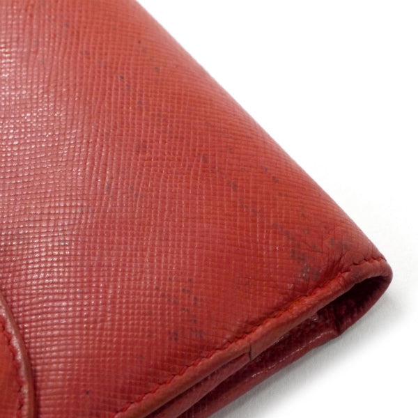 OLD Gucci  ＜訳あり＞金ボタン型押しWホック折財布（朱色）