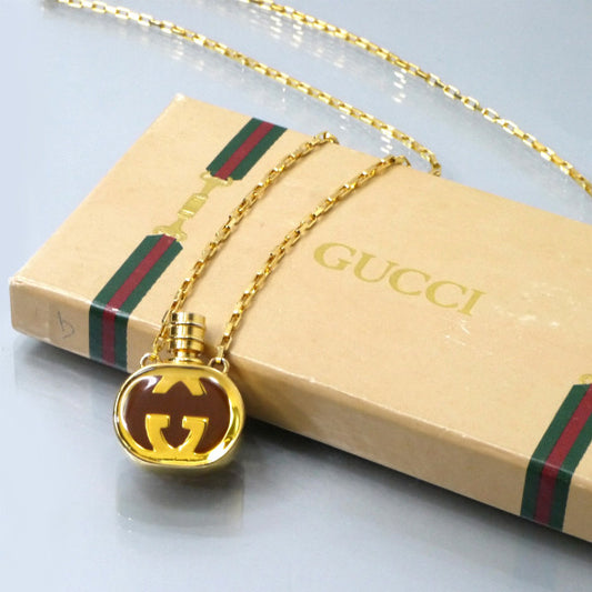 OLD Gucci　GGマーク香水ボトル ペンダント（ゴールド）