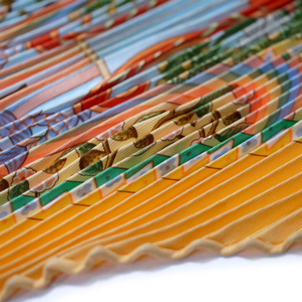 HERMES　プリーツスカーフ90"AXIS MUNDI"（橙系/世界の中心軸）