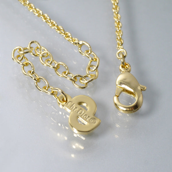 C.Dior ツイストラウンドロゴカットアウトネックレス（ゴールド）