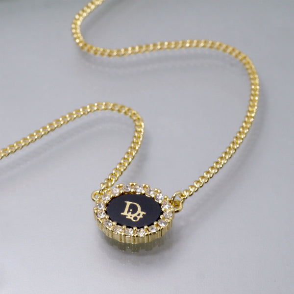 C.Dior ラインストーンオーバルロゴネックレス（ブラック×ゴールド）
