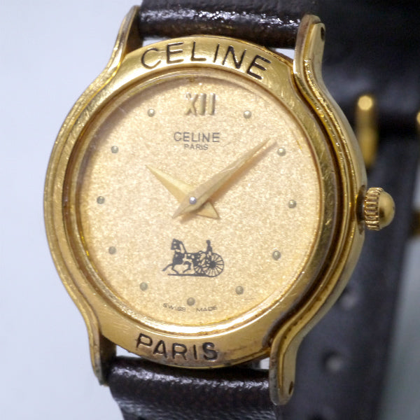 OLD CELINE ラウンド馬車ロゴフェイス腕時計（濃茶）