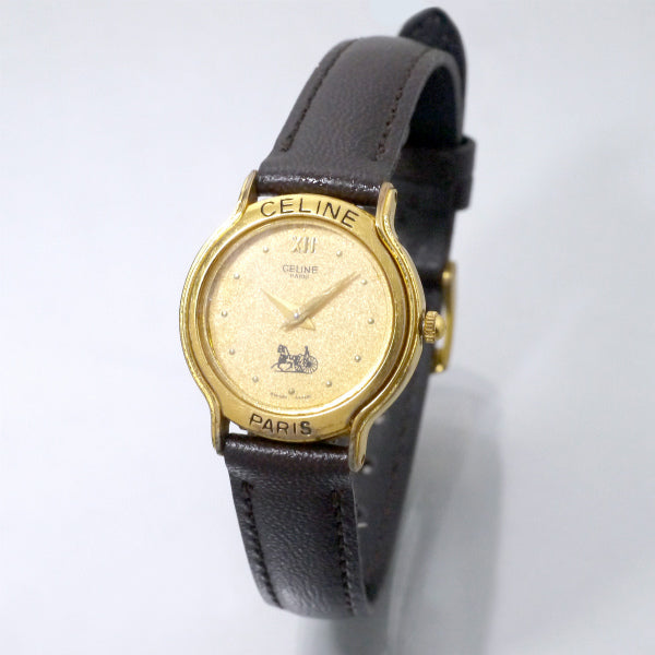 OLD CELINE ラウンド馬車ロゴフェイス腕時計（濃茶）