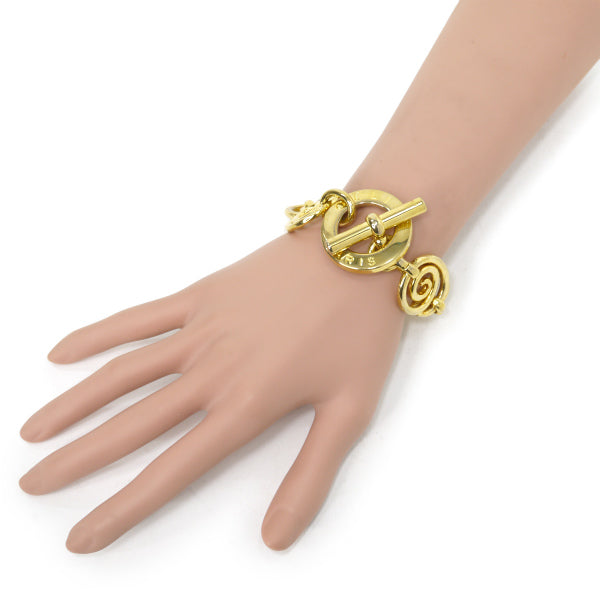 CELINE マンテル留め具大ぶり渦巻きブレスレット（ゴールド）