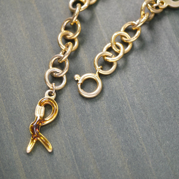 Roberta　Rモチーフ ブレスレット(べっ甲調)