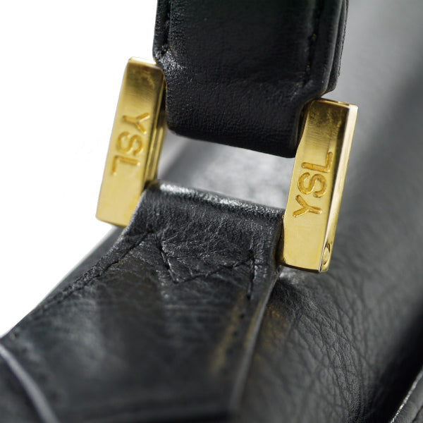 YVES SAINT LAURENT 総革カサンドラ ロゴ台形ハンドバッグ（黒）