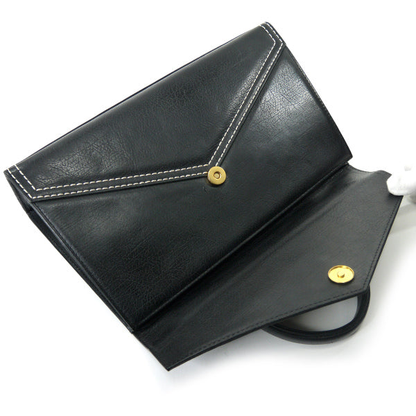 YVES SAINT LAURENT 総革カサンドラ ロゴ台形ハンドバッグ（黒）