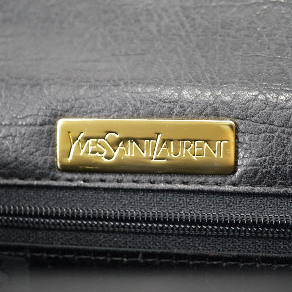 YVES SAINT LAURENT 総革カサンドラ ロゴ台形ハンドバッグ（黒）