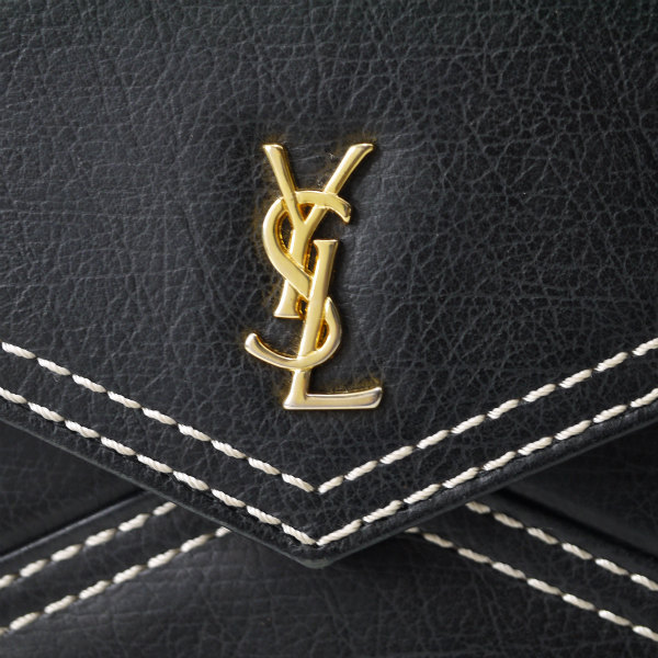 YVES SAINT LAURENT 総革カサンドラ ロゴ台形ハンドバッグ（黒